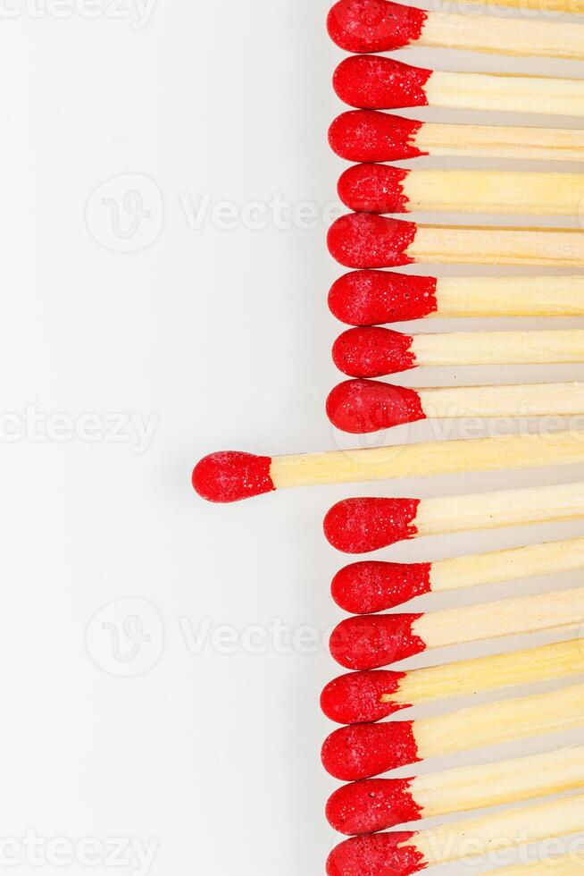 matches with a red head on a white background photo