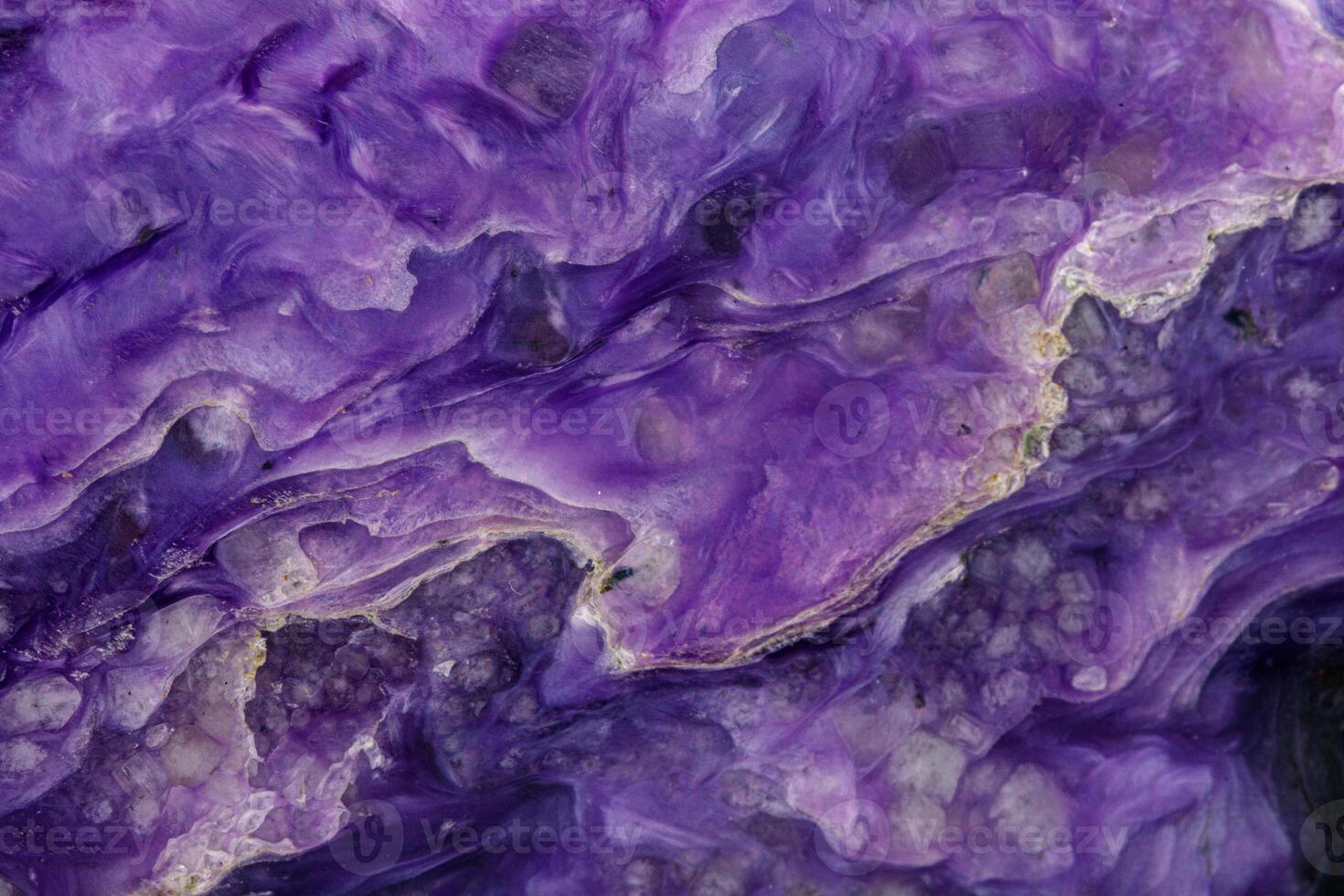 macro mineral stone Charoite on a white background photo