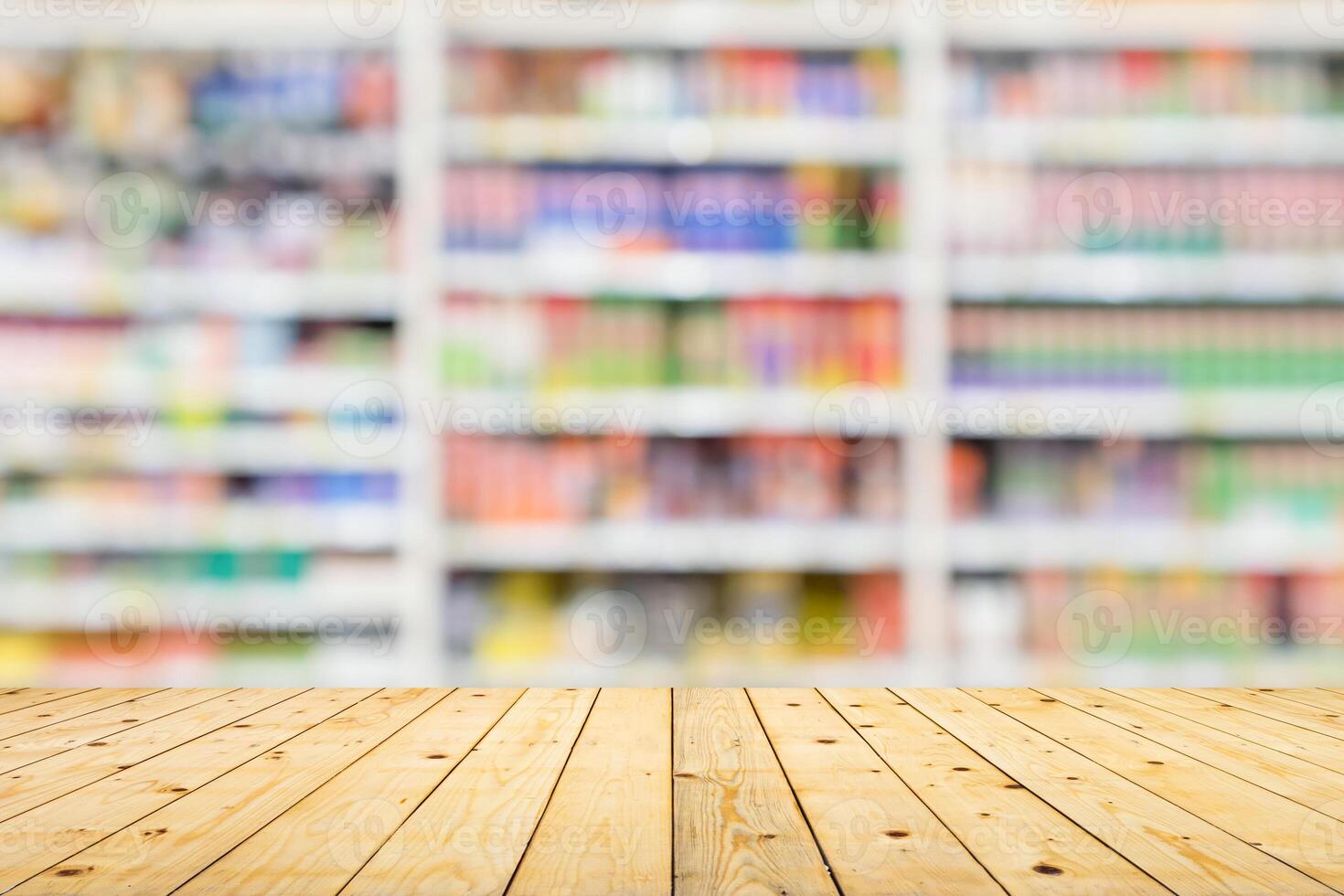 Empty wood table top with supermarket blurred background for product display photo