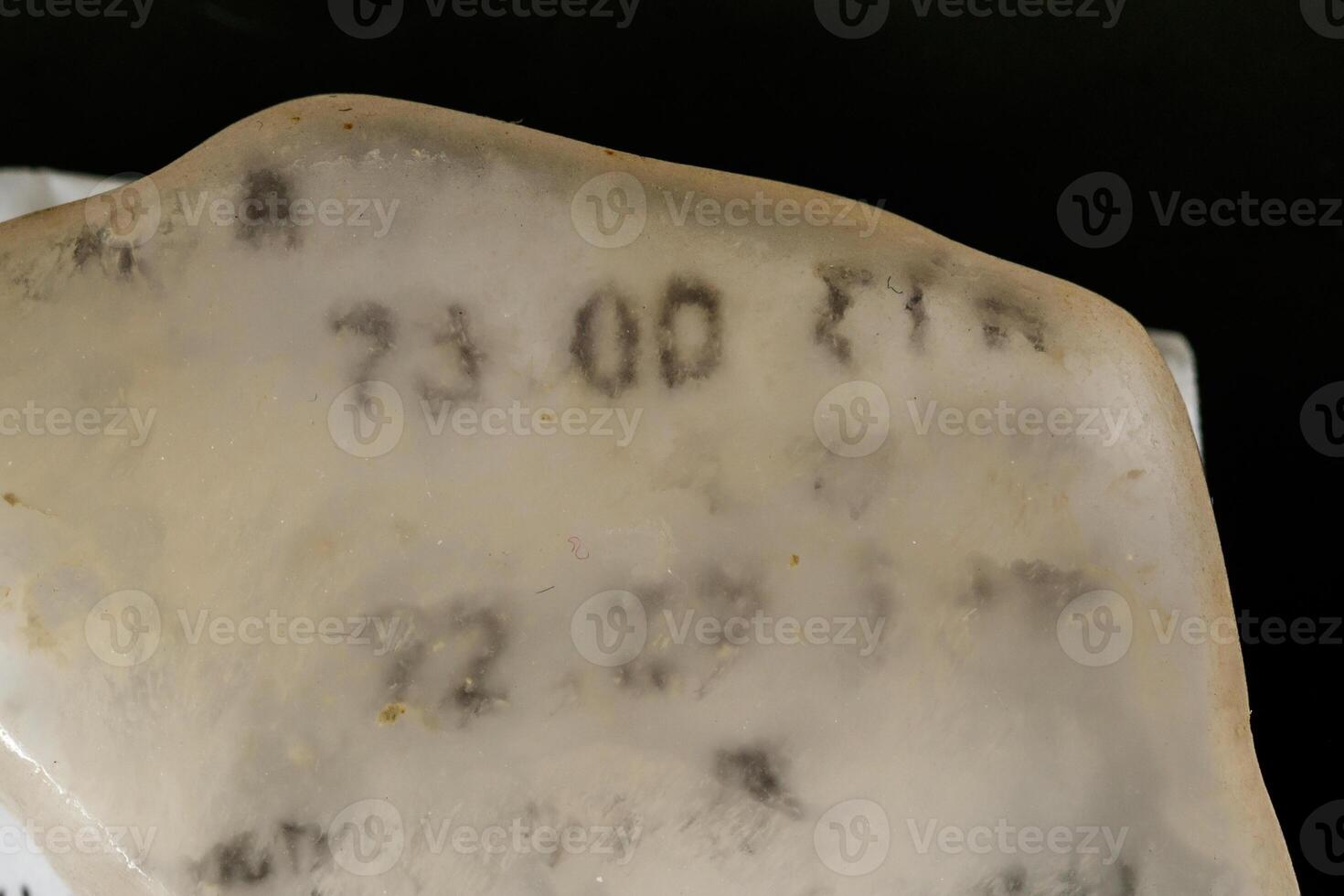 Macro stone mineral Ulexite on a black background photo