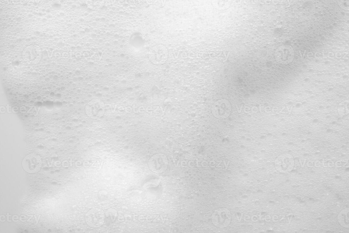 Abstract white soap foam bubbles texture background photo