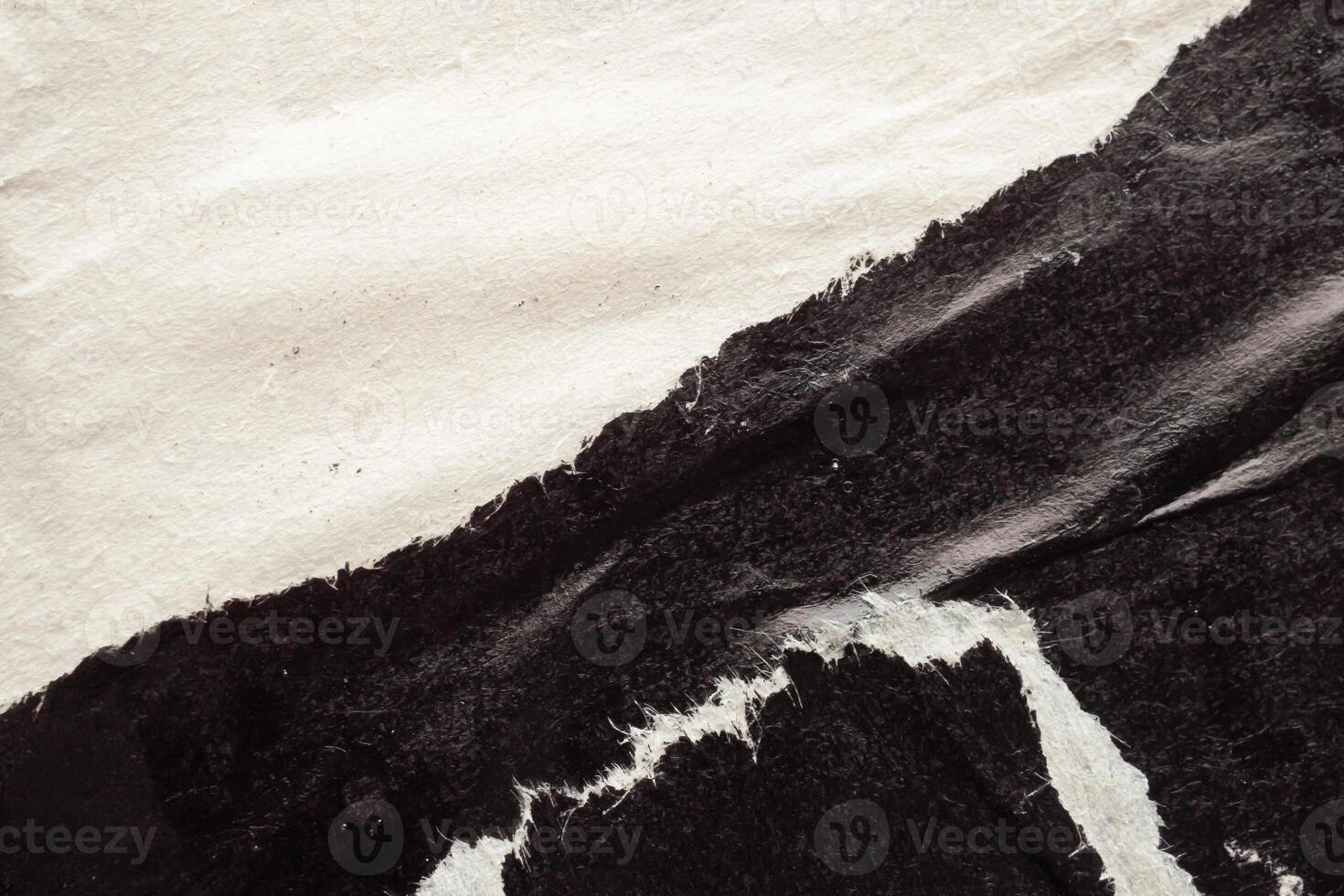 Old grunge ripped torn black paper poster surface texture background photo