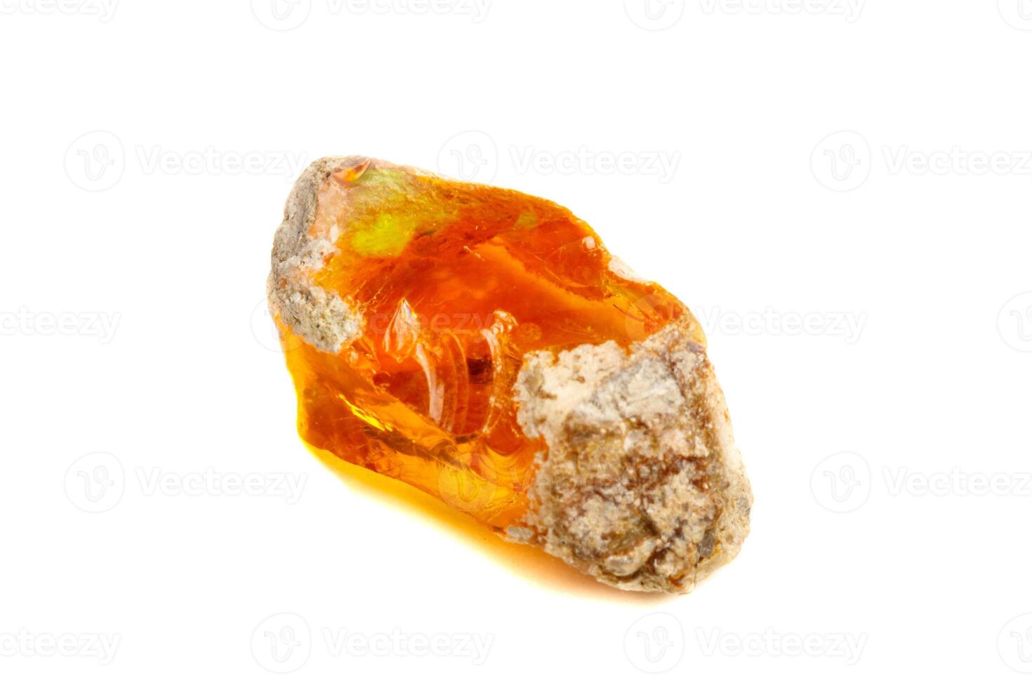 Macro Opal mineral stone in rock on white background photo