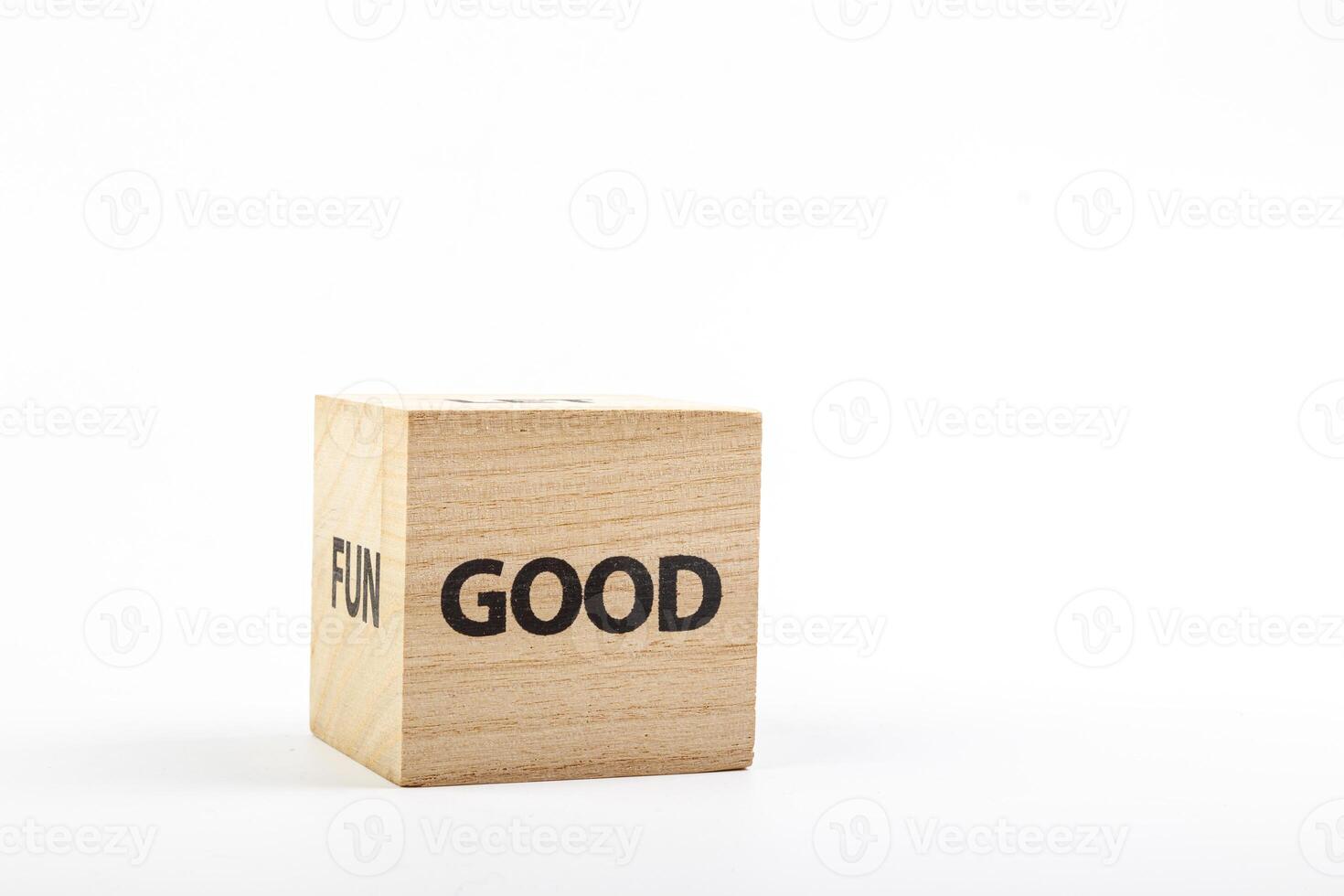 Wooden cubes with the inscription good on a white background photo