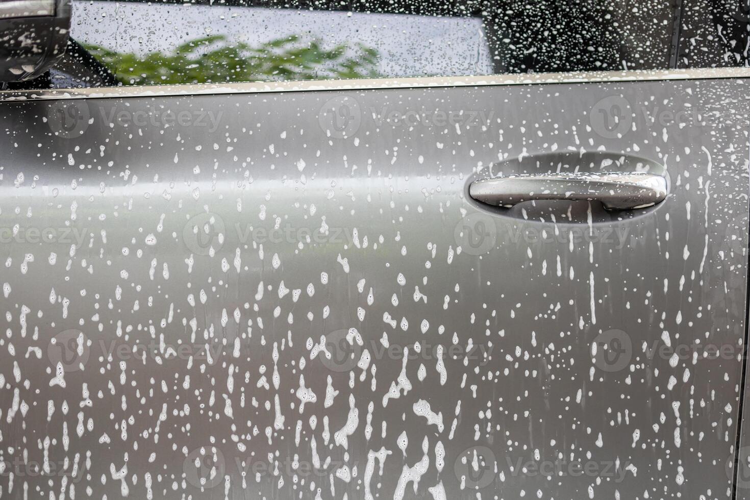 car cleaning and washing with foam soap photo