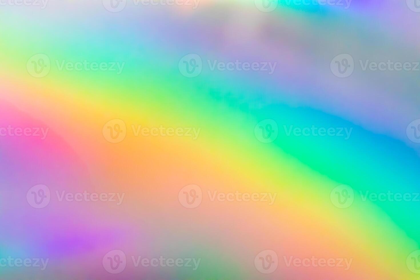 Abstract blur holographic rainbow foil iridescent background photo