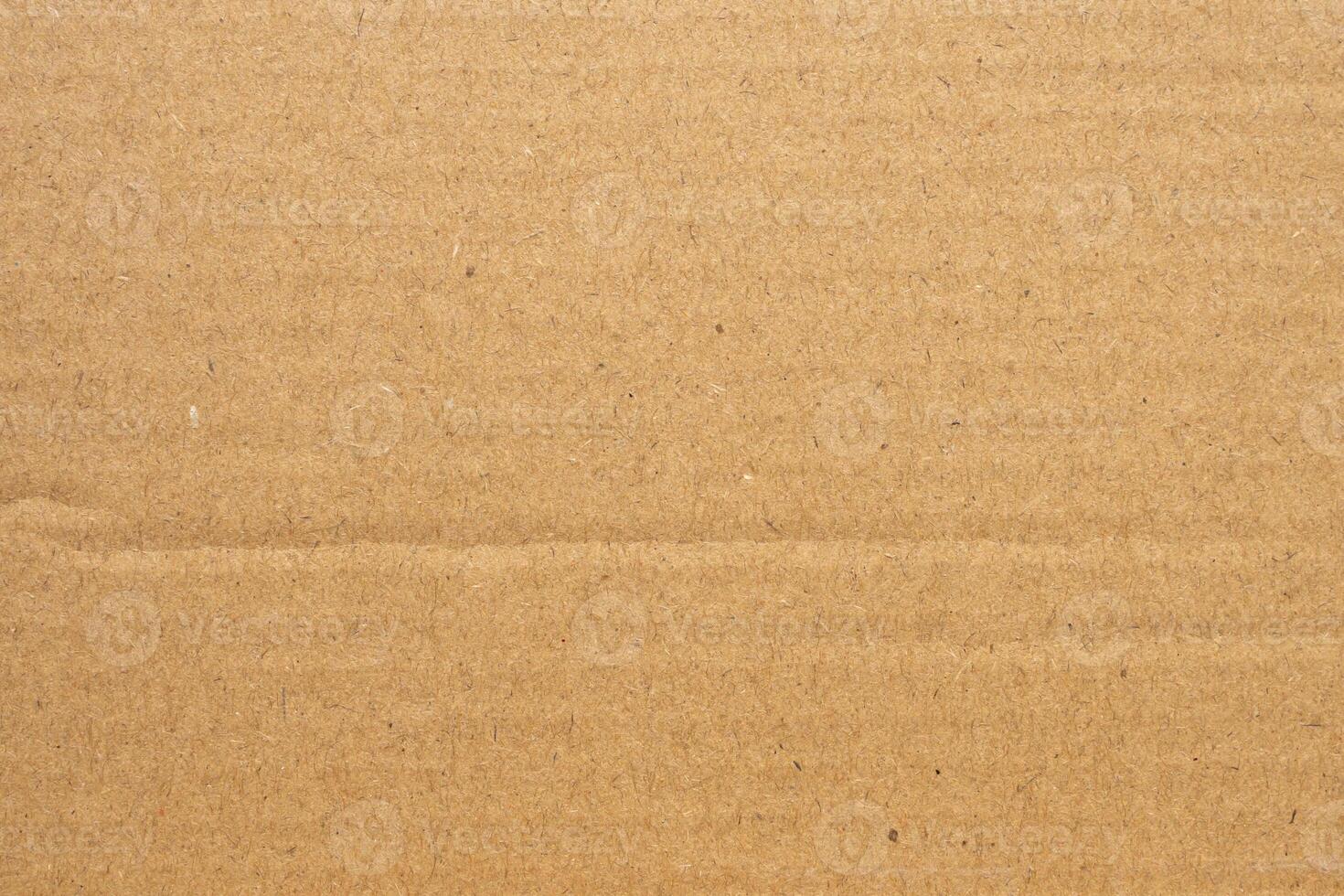 Fondo de textura de papel de caja de cartón marrón antiguo foto