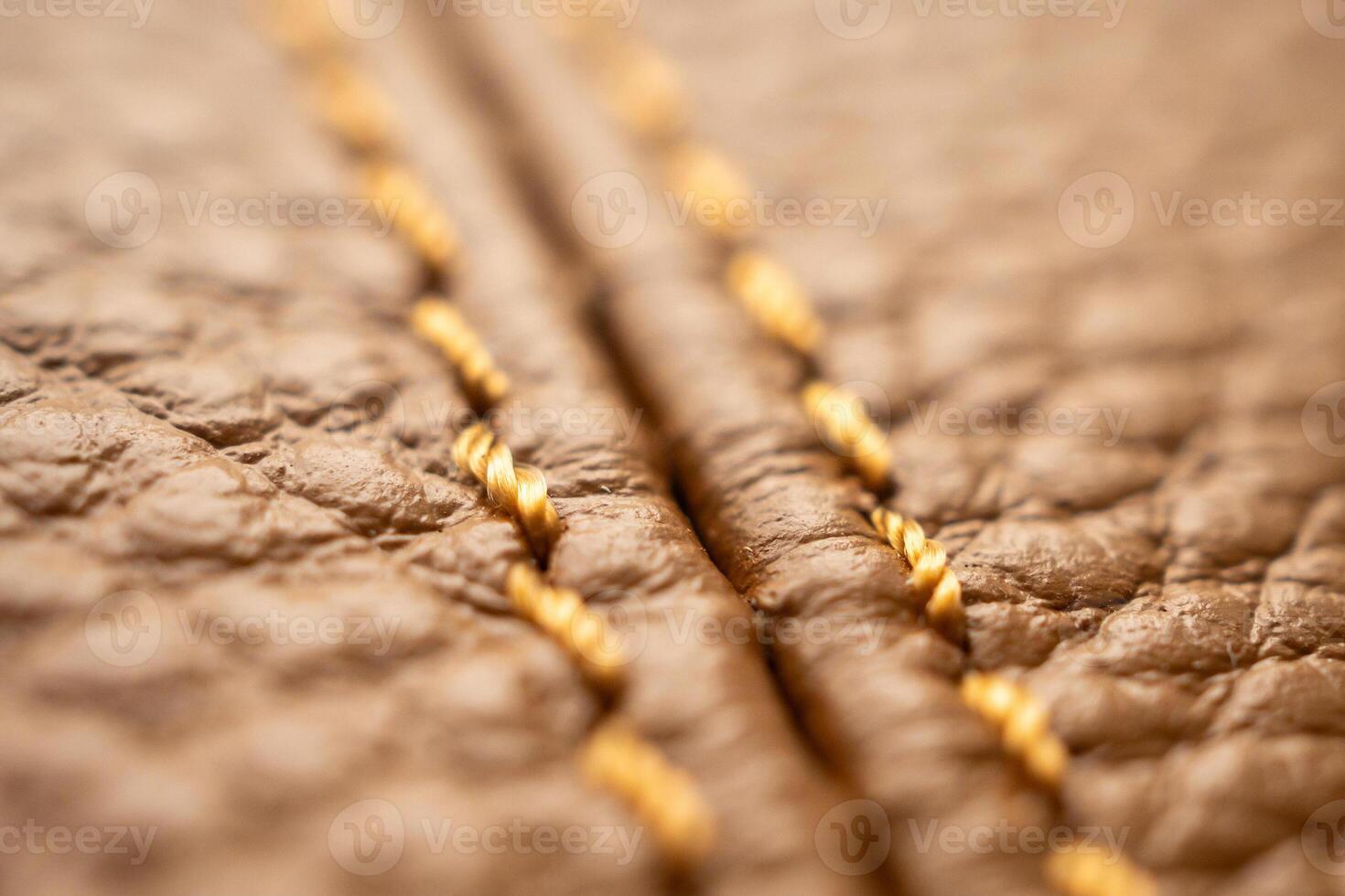 luxury brown leather bag texture background with stitching photo