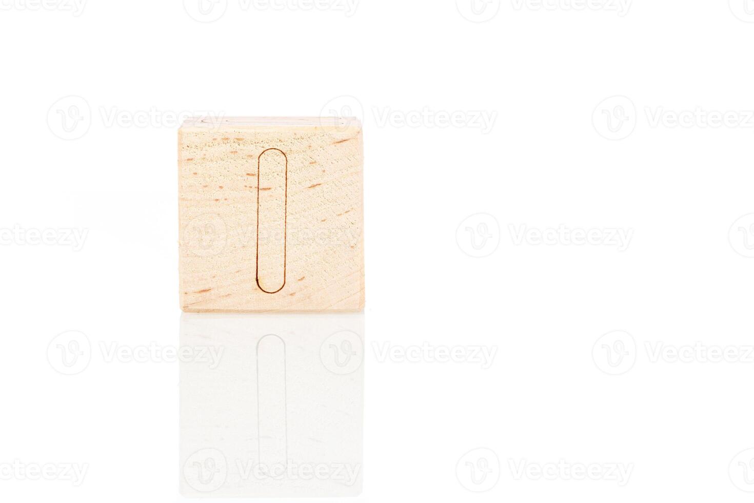 Wooden cubes with letters I on a white background photo