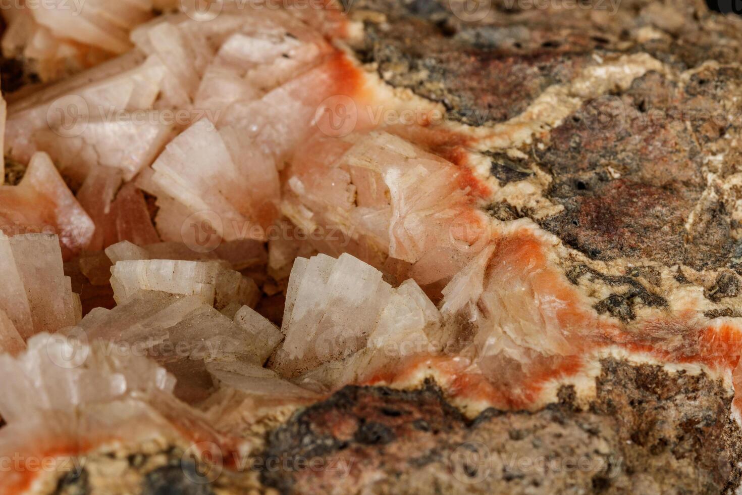 Macro of a stone Stilbite mineral on a black background photo