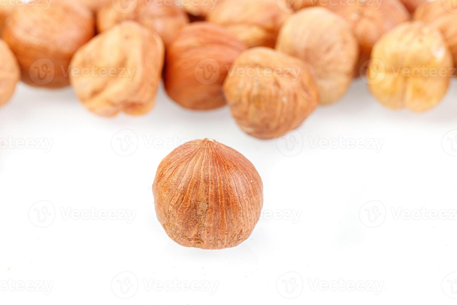 macro hazelnuts nuts on a white background photo