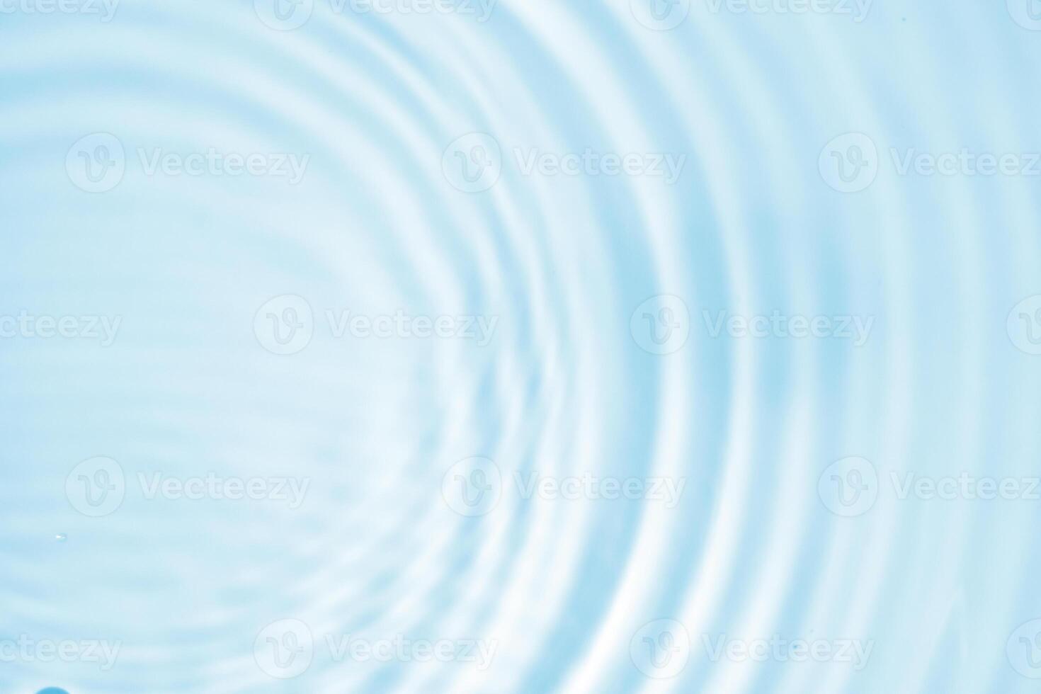 Abstract transparent water shadow surface texture natural ripple on blue background photo