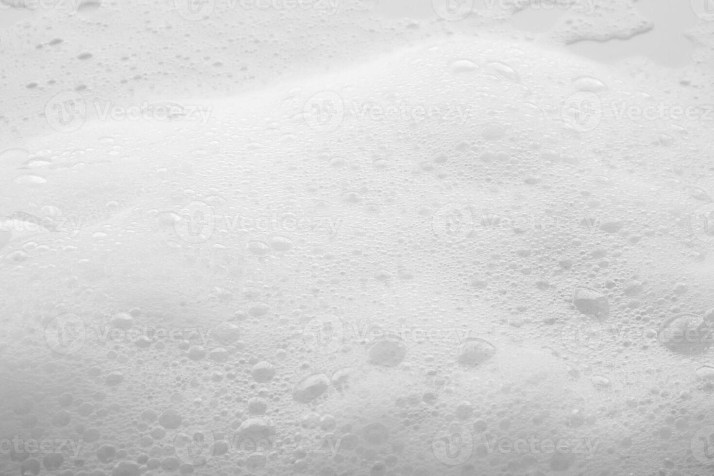Abstract white soap foam bubbles texture background photo