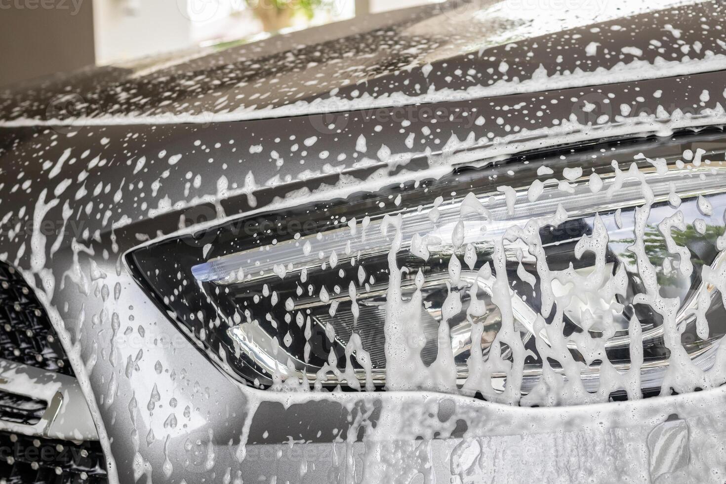 car cleaning and washing with foam soap photo