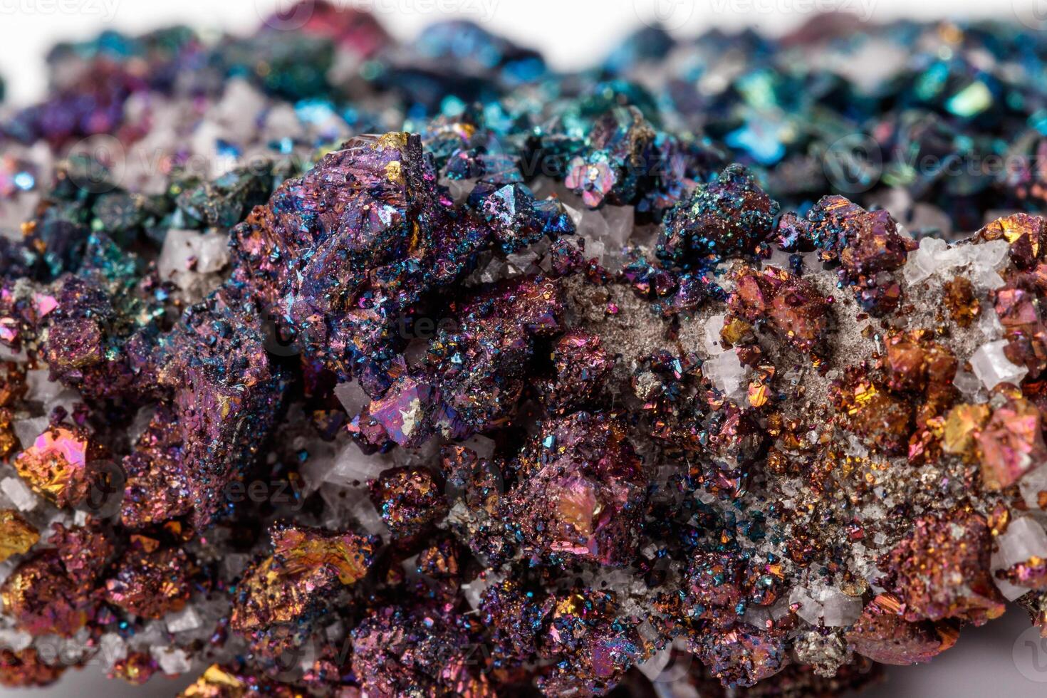 Macro mineral stone Chalcopyrite on a white background photo