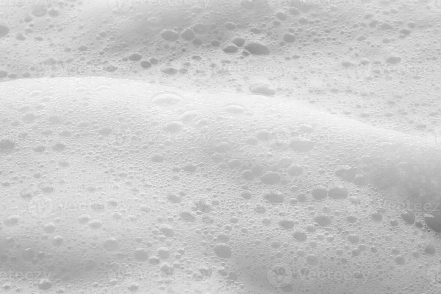 Abstract white soap foam bubbles texture background photo