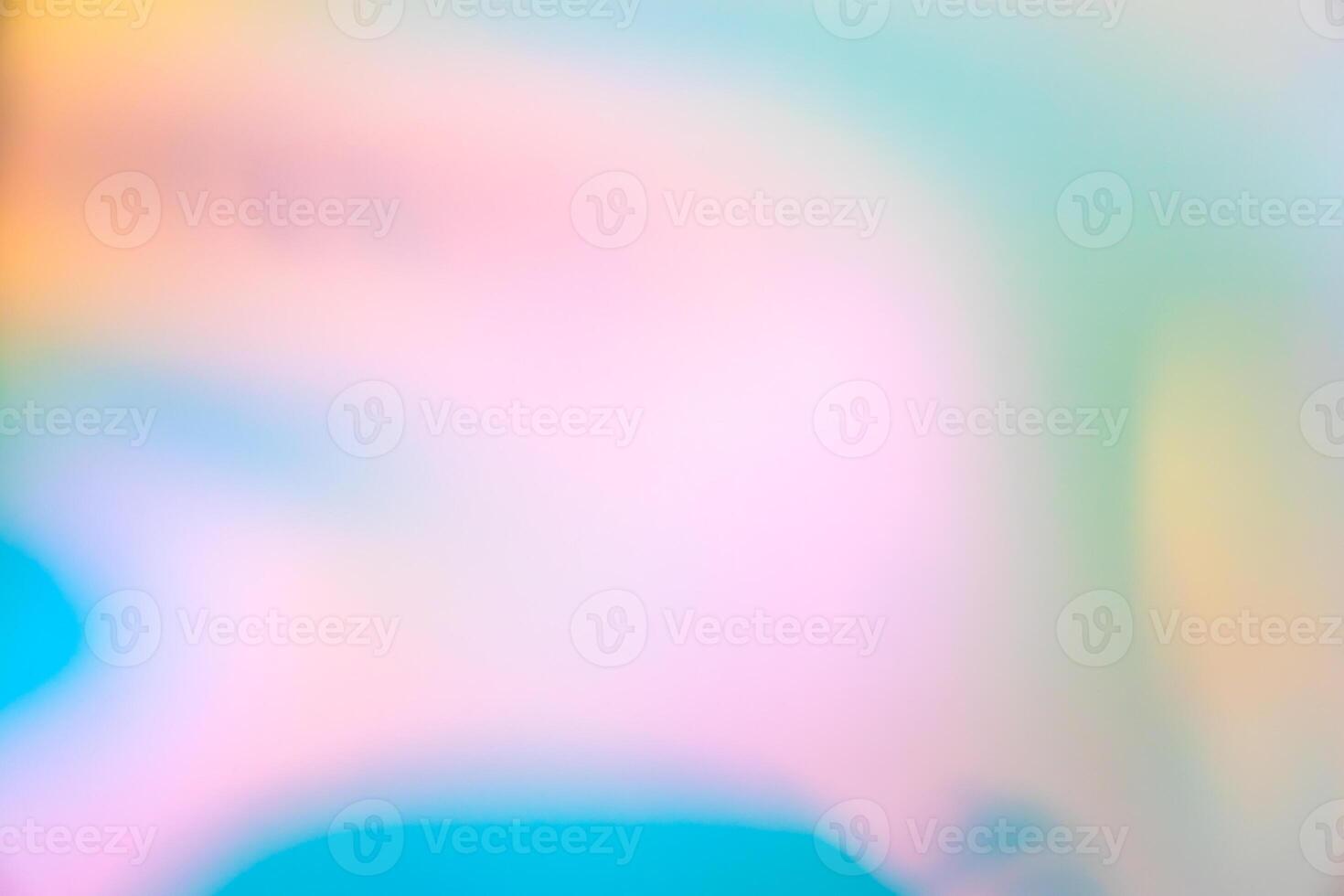 Abstract blur holographic rainbow foil iridescent background photo