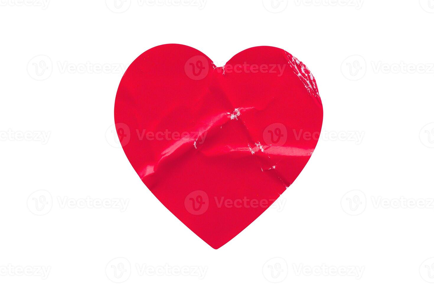 Red color heart shape sticker isolated on white background photo