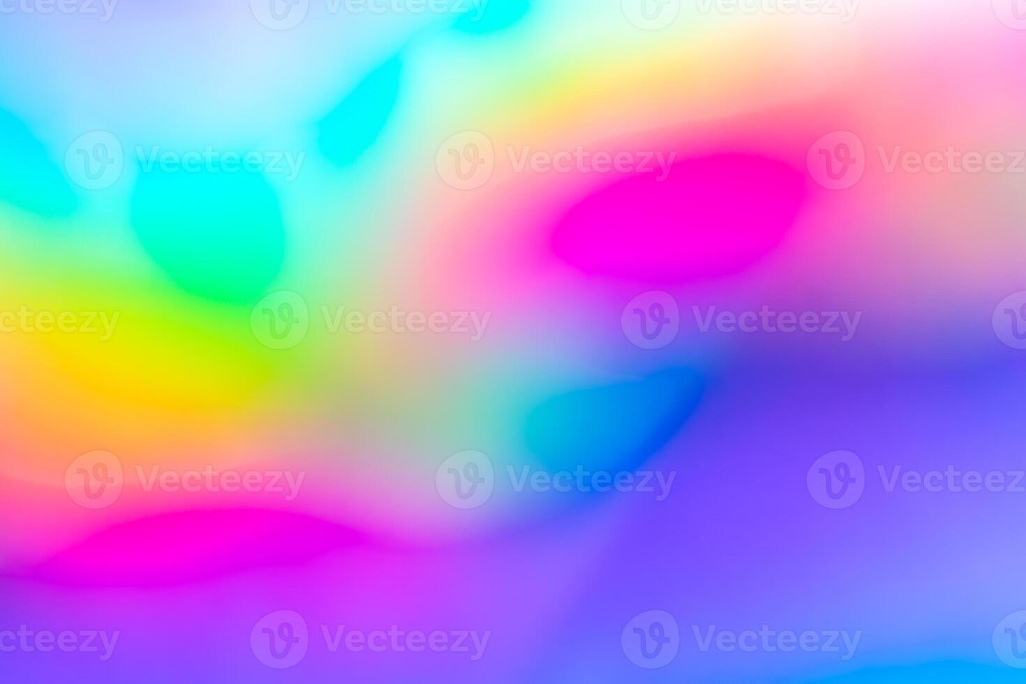 Abstract blur holographic rainbow foil iridescent background photo