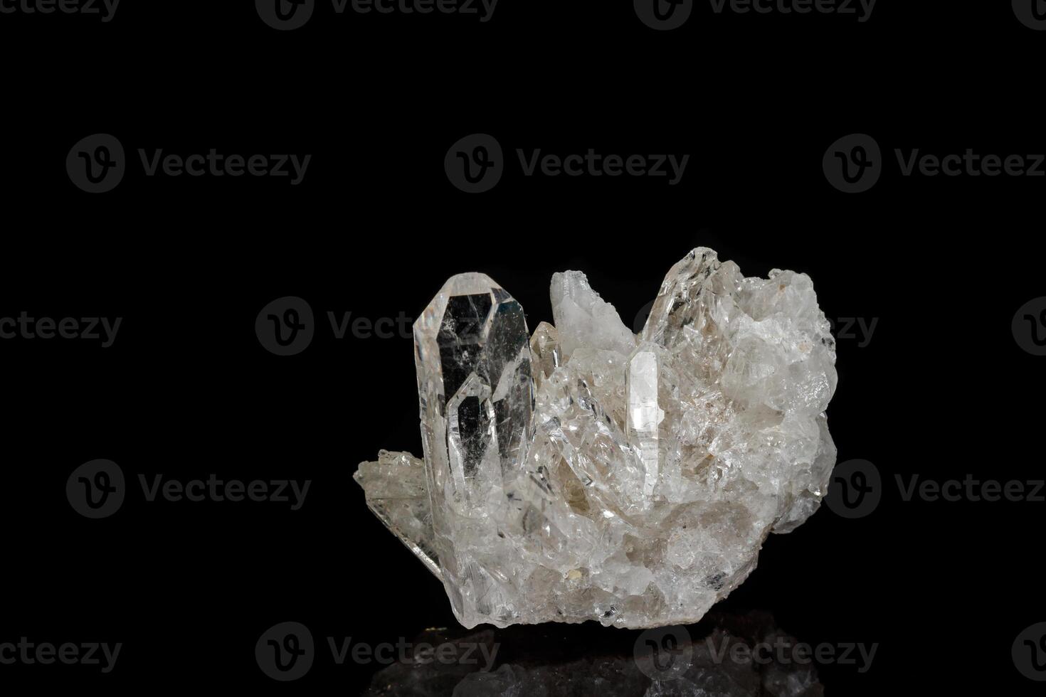 Macro mineral stone rhinestone, rock crystal on a black background photo