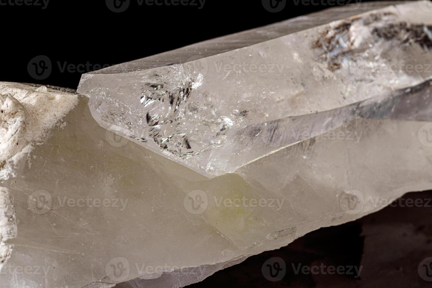 Macro mineral stone rhinestone, rock crystal on a black background photo