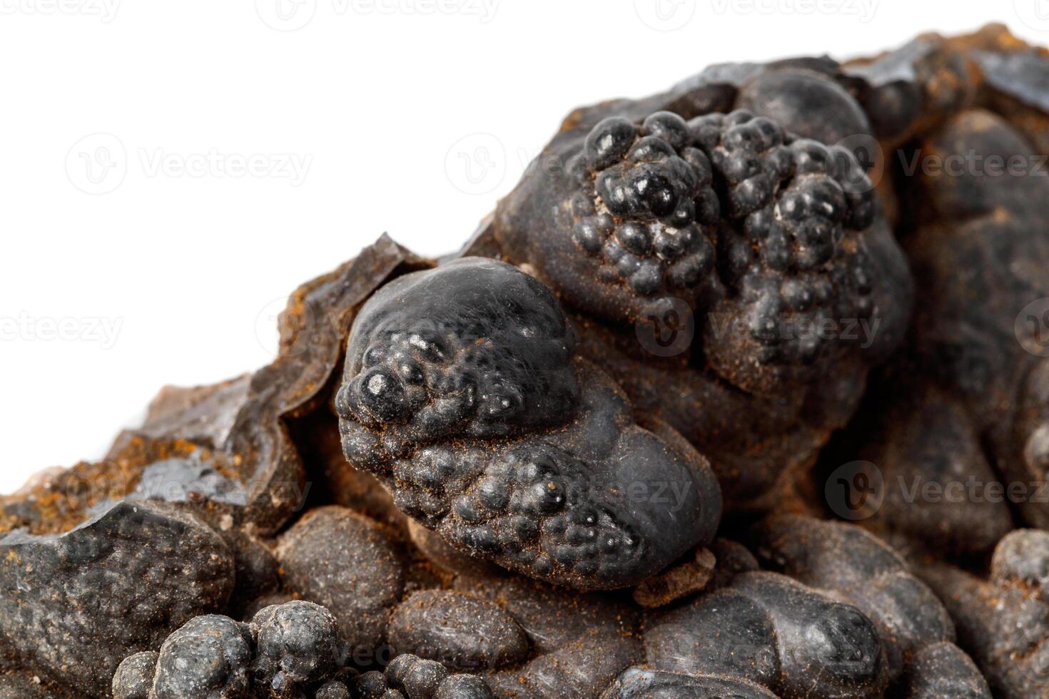 Macro mineral Hematite stone on a white background close-up photo