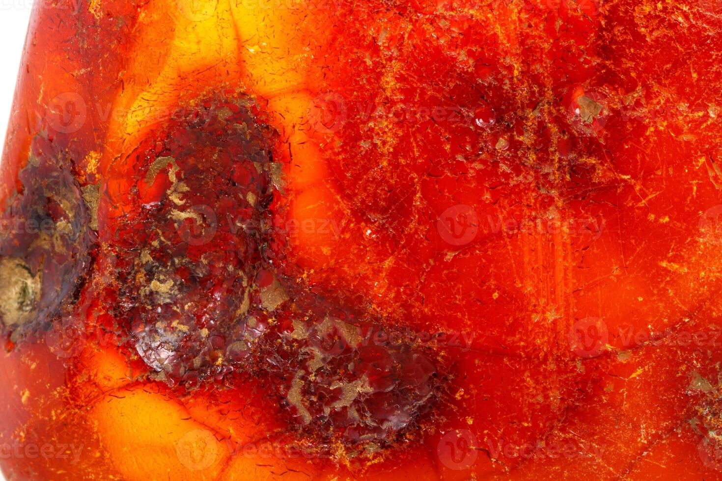 Macro Amber mineral stone on white background photo