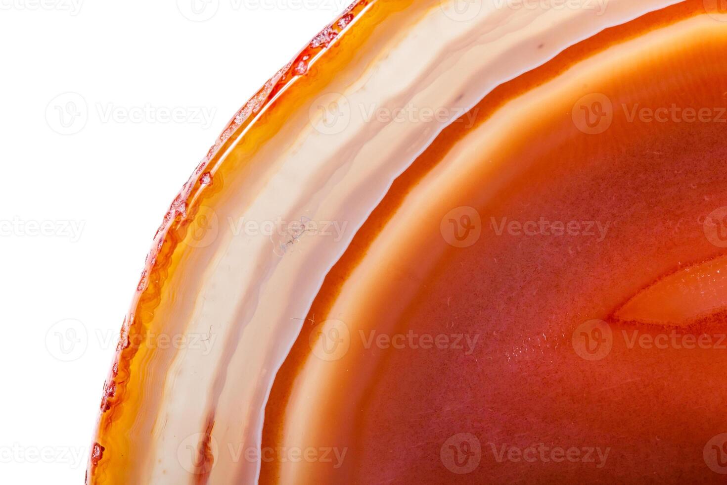 Macro mineral orange agate in crystals on white background photo