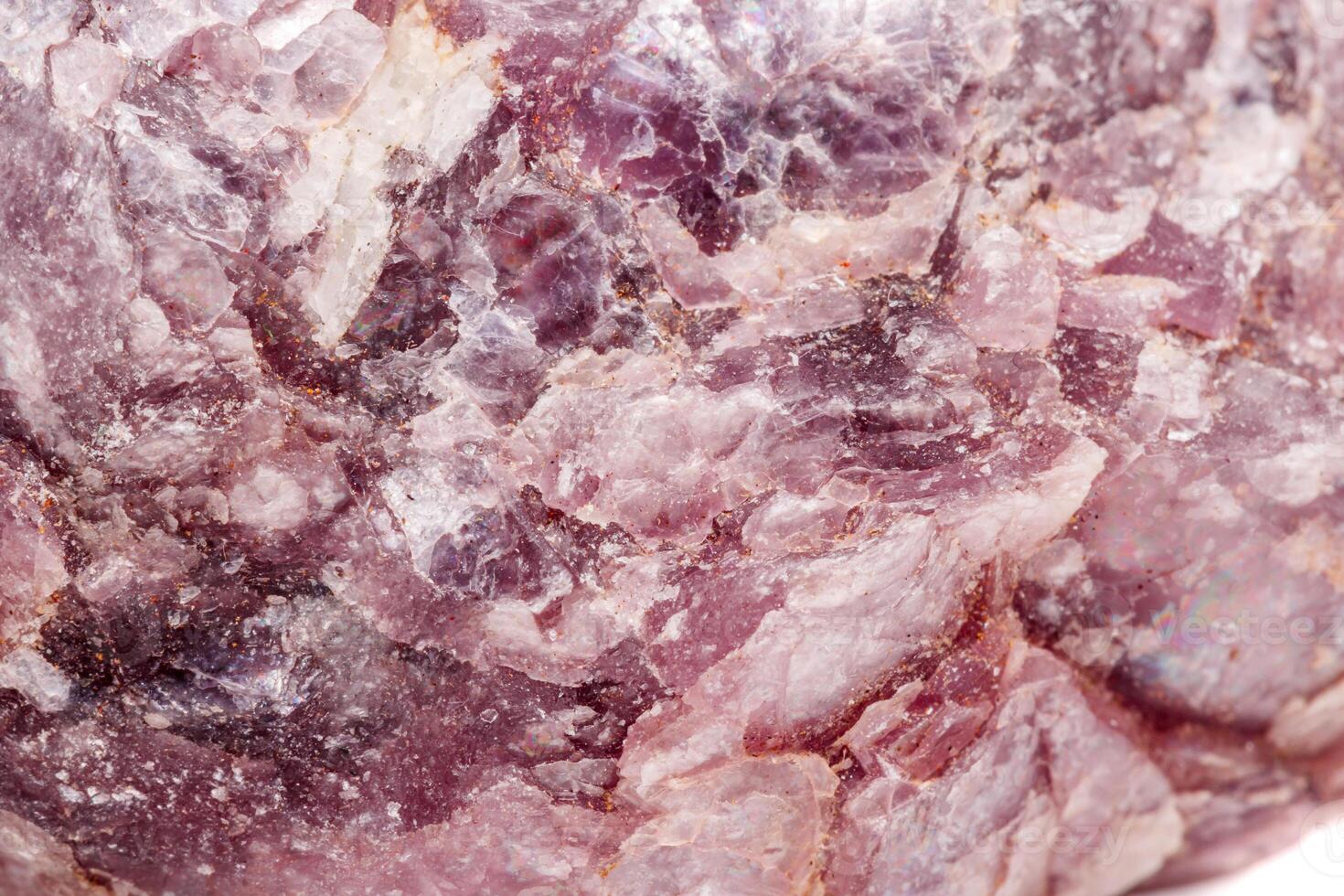 Macro mineral stone Lepidolite in the rock a white background photo