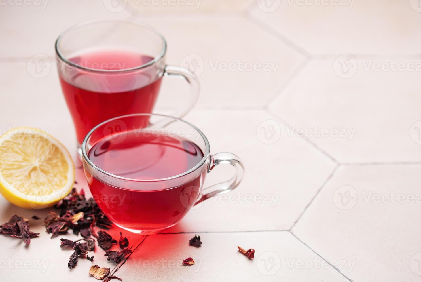 Glass cup of hot hibiscus tea. photo
