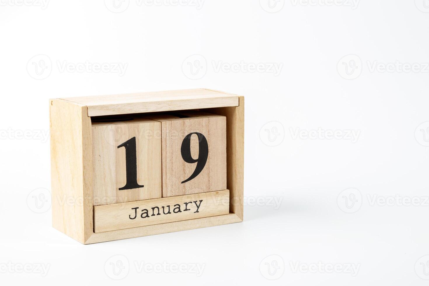 Wooden calendar January 19 on a white background photo