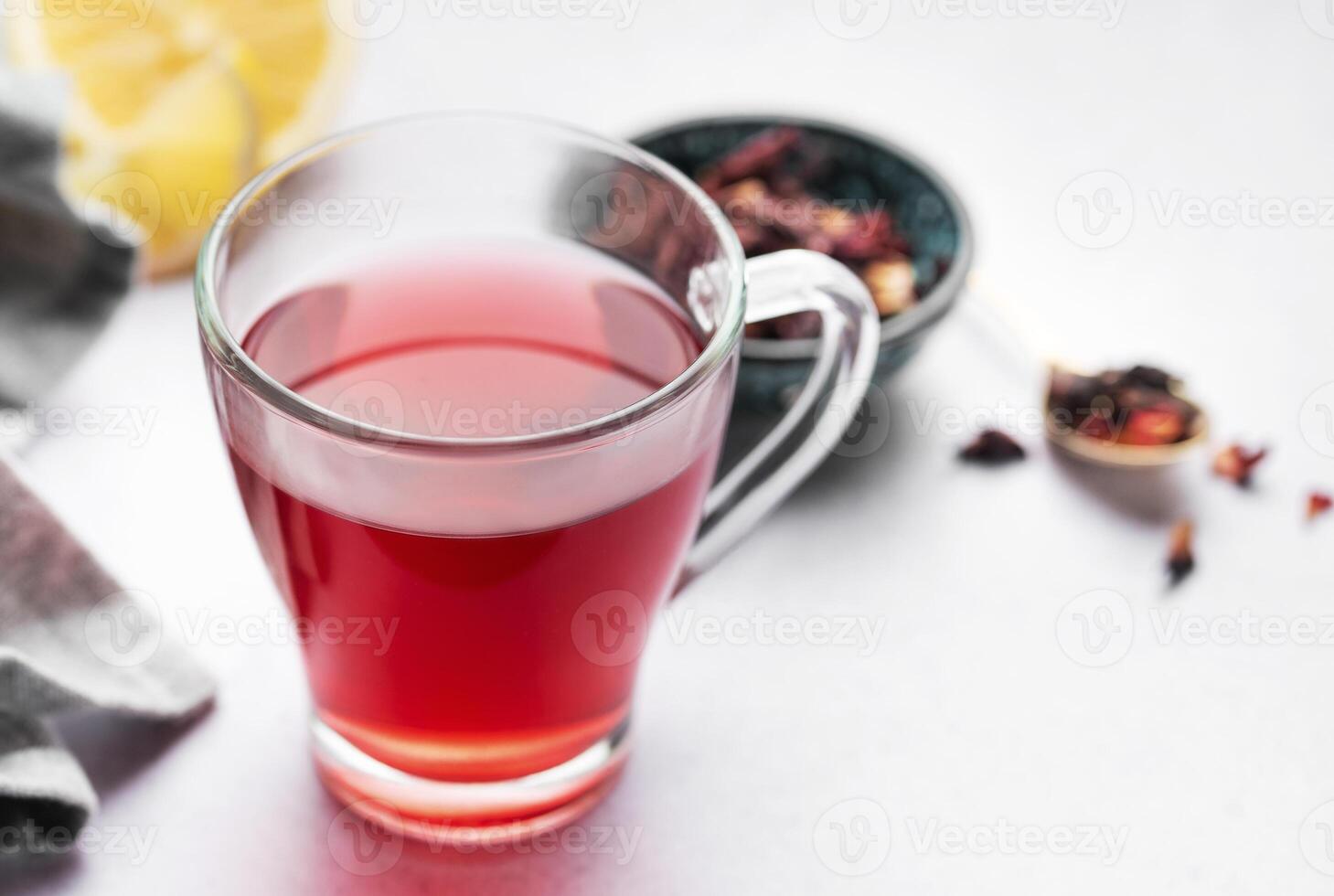 Glass cup of hot hibiscus tea. photo