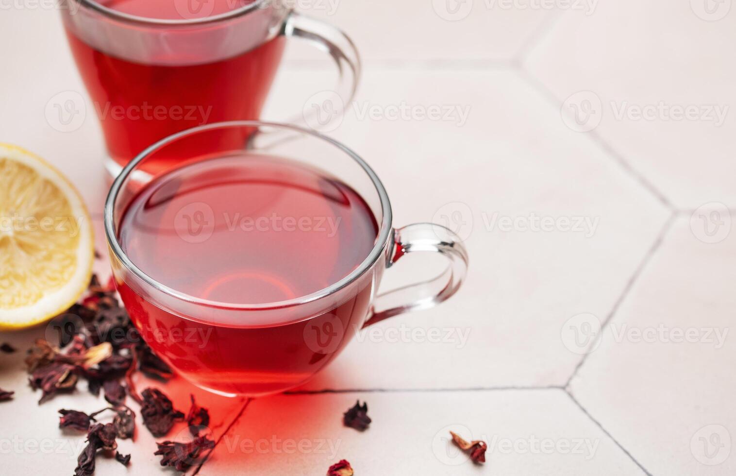 Glass cup of hot hibiscus tea. photo