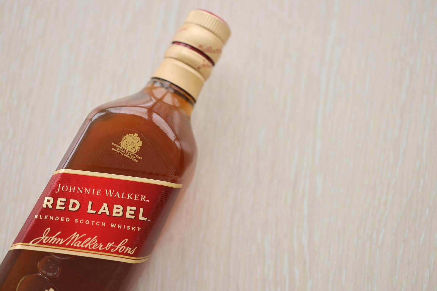 KYIV, UKRAINE - NOVEMBER 27, 2023 Johnnie Walker red label scotch whisky bottle photo
