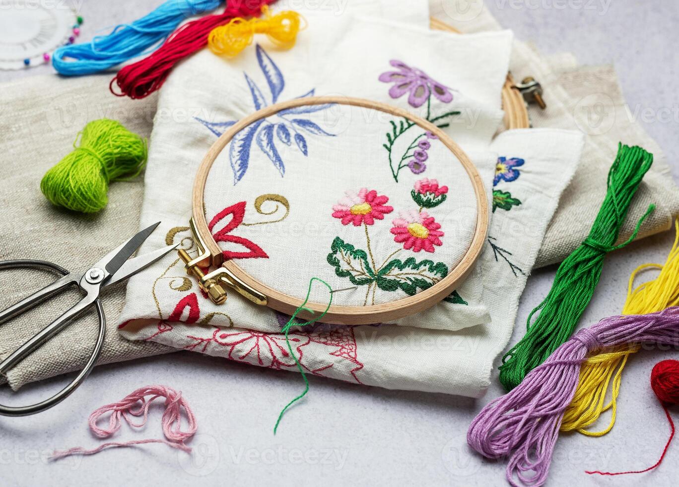 The process of hand embroidering a napkin photo