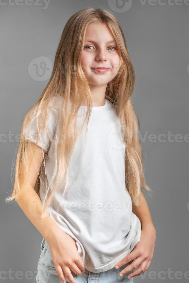 Portrait of cute little girl with long light hair photo