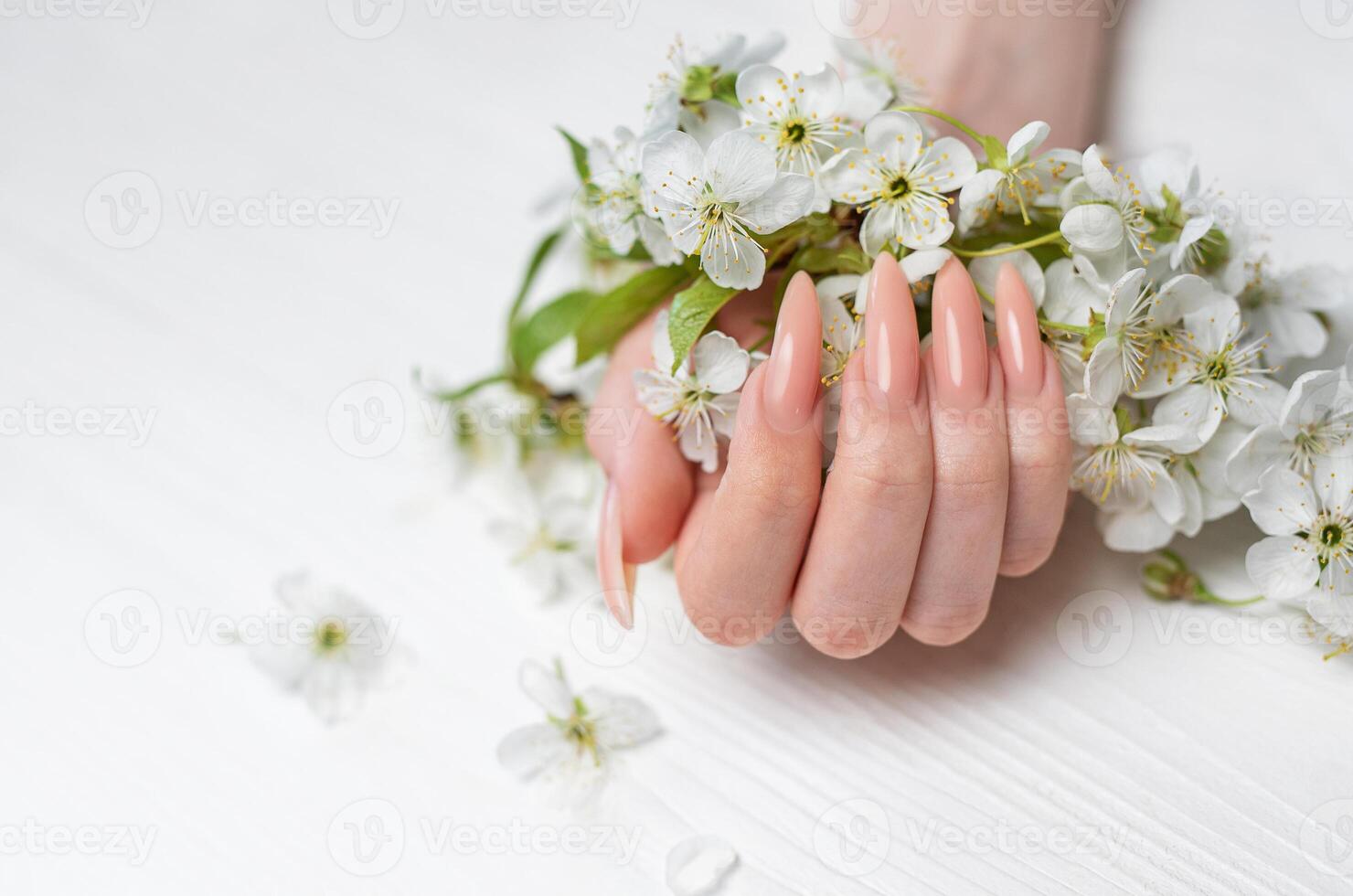 Elegant pastel pink natural manicure. photo