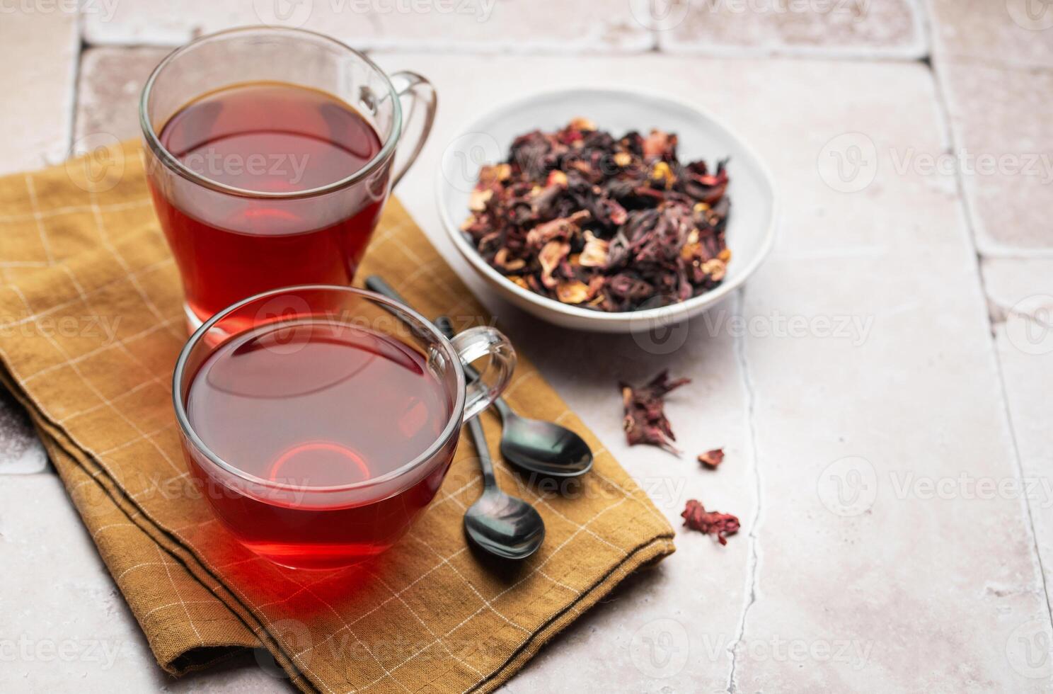 Glass cup of hot hibiscus tea. photo