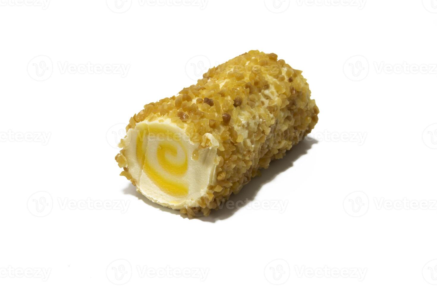 A fruity cheese roll with pineapple and topped with almonds, isolated on a white background. Concept of innovation in food. photo