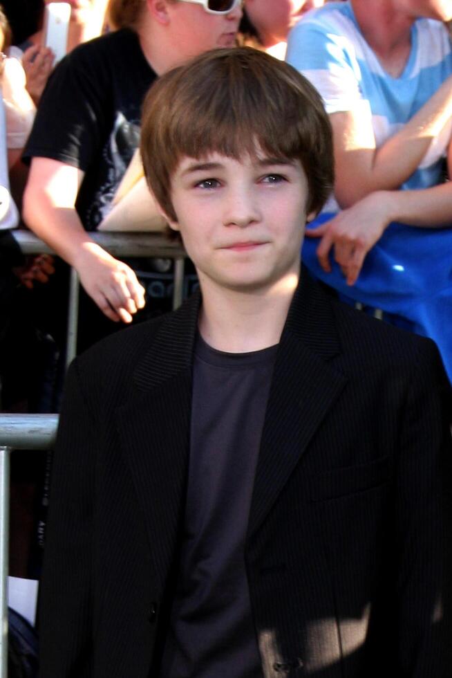 LOS ANGELES - AUG 6  CJ Adams, aka Cameron Adams arriving at the World Premiere of  The Odd Life of Timothy Green  at El Capitan Theater on August 6, 2012 in Los Angeles, CA photo