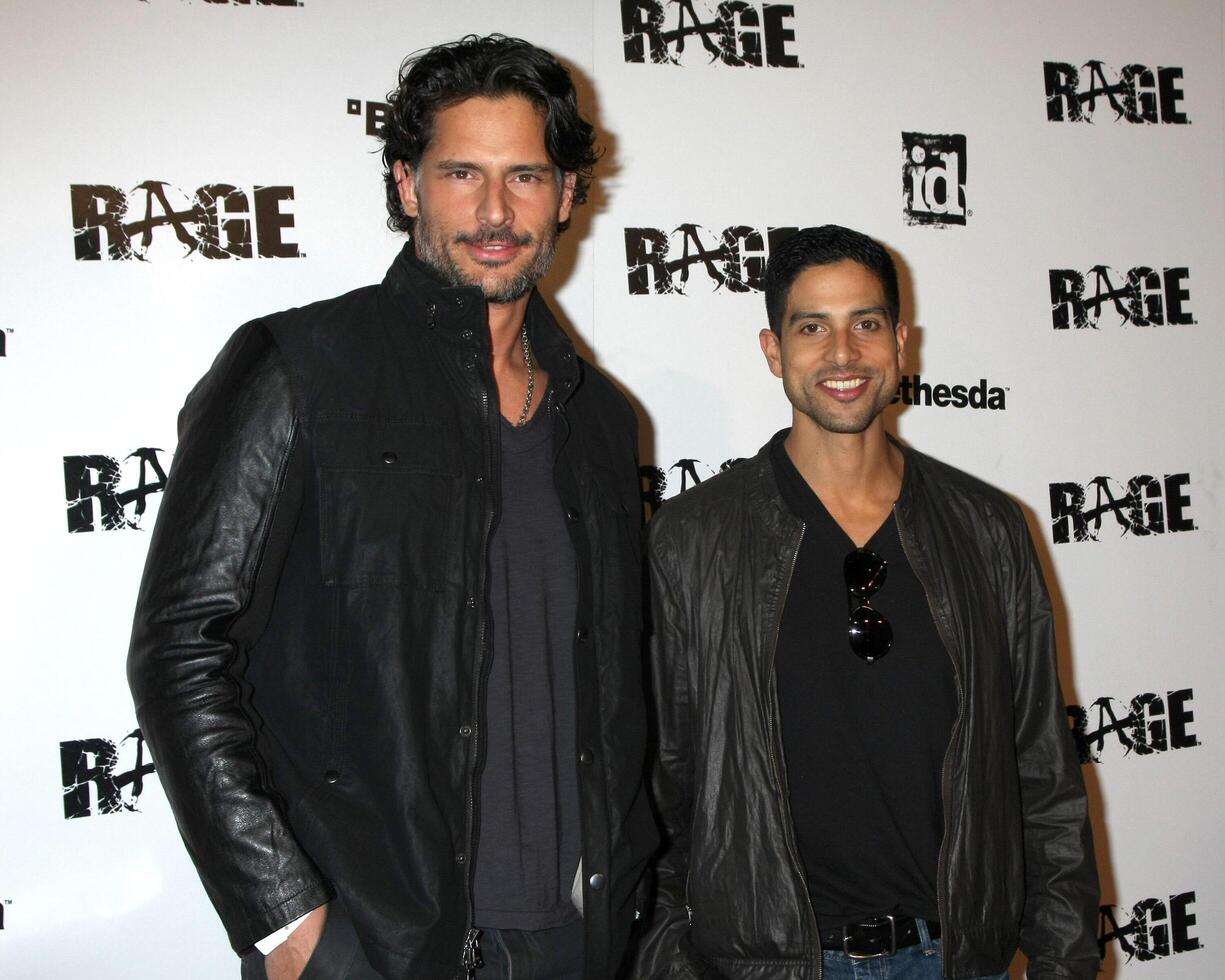 LOS ANGELES - SEPT 30  Joe Manganiello, Adam Rodriguez arriving at  the RAGE Game Launch at the Chinatowns Historical Central Plaza on September 30, 2011 in Los Angeles, CA photo