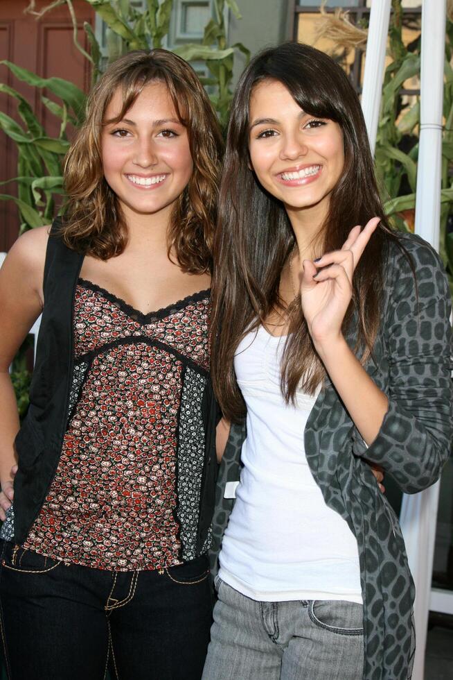 Taylor Dooley  Victoria Justice arriving to the Camp Ronald McDonald Event on the backlot of Universal Studios, in Los Angeles, CA  on October 26, 2008 photo