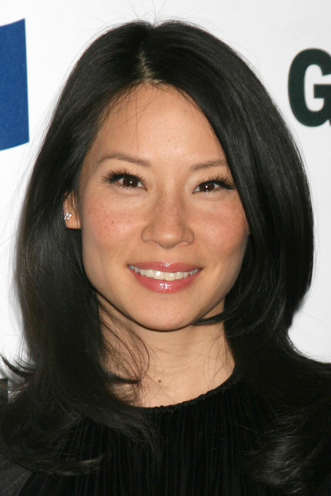 Lucy Liu arriving at the Glamour Reel Moments Premieres of a Series of