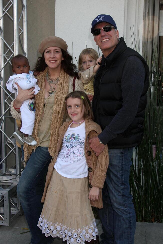 Joely Fisher  Family    arriving at the 7th Annual John Varvatos Stuart House Benefit at the John Varvatos Store in West Hollywood, CA  on March 8, 2009 photo