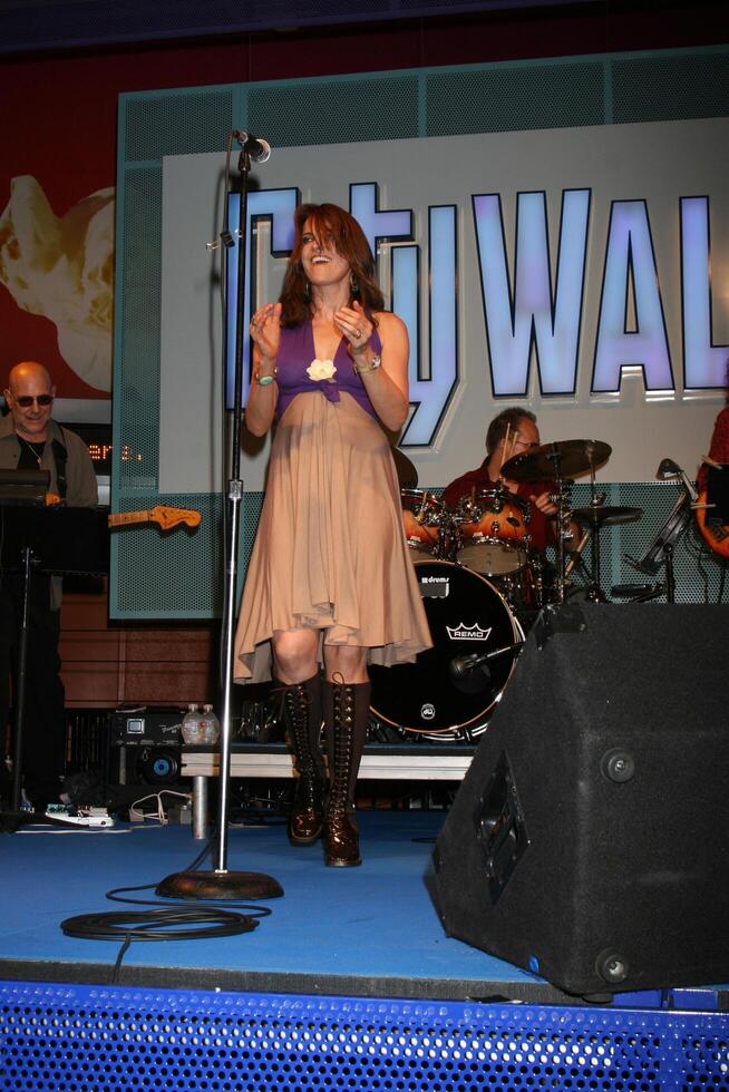 Lucy Lawless performs at Universal CityWalk's Summer Block Party in Universal City, CA on June 28, 2008 photo