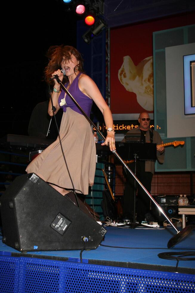 Lucy Lawless performs at Universal CityWalk's Summer Block Party in Universal City, CA on June 28, 2008 photo