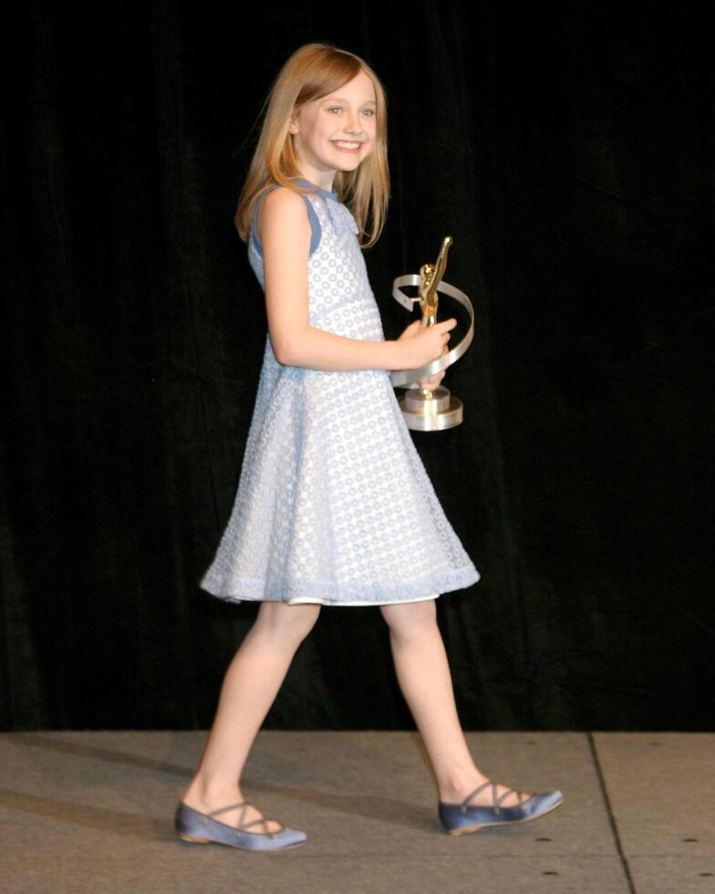 Dakota FanningShoWest Award Show 2006Paris Hotel  CasinoLas Vegas NVMarch 16  20062006 photo