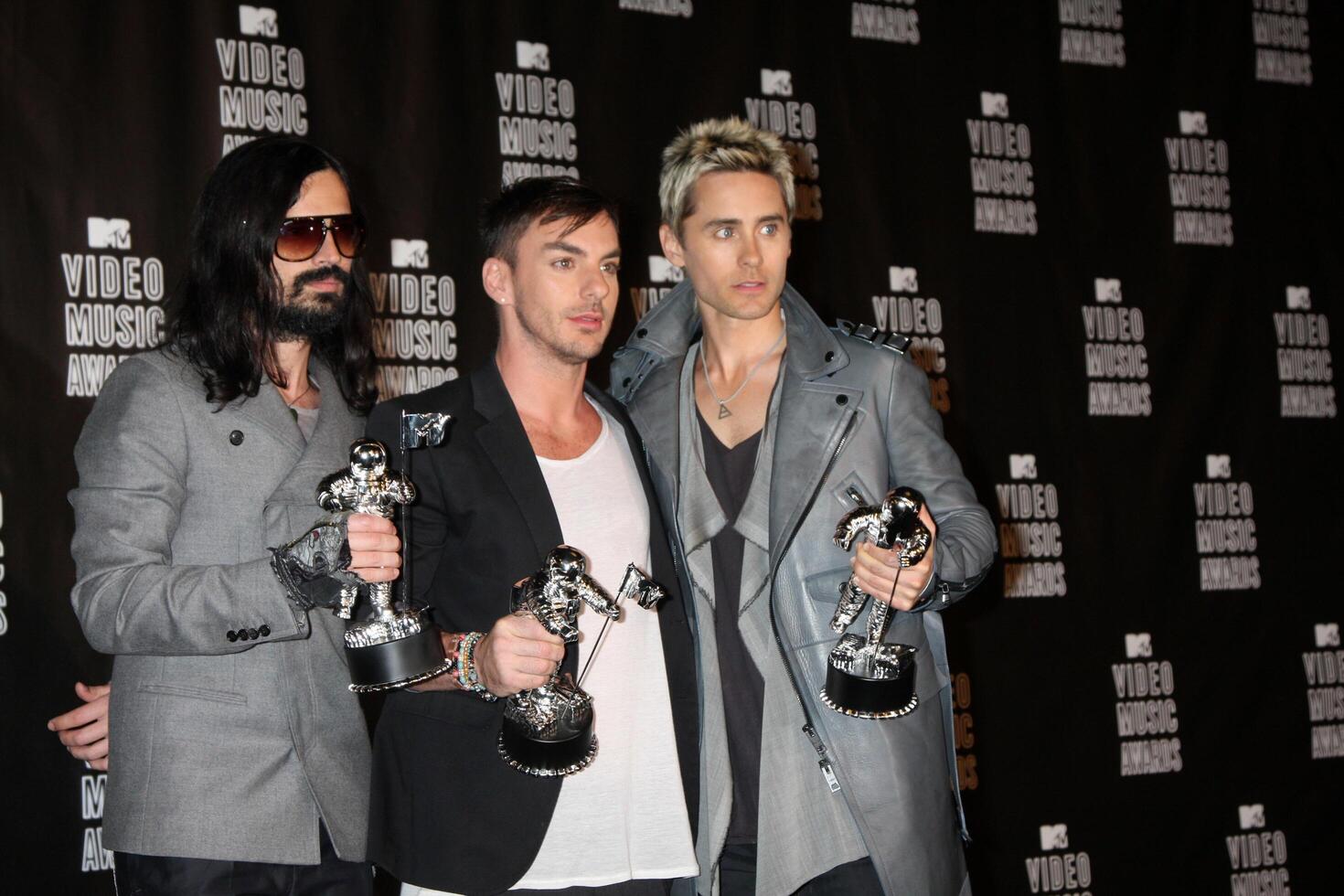 LOS ANGELES  SEP 12  Tomo Milicevich Shannon Leto and Jared Leto of 30 Seconds to Mars in the Press Room  at the 2010 MTV Video Music Awards  at Nokia  LA Live on September 12 2010 in Los Angeles CA photo