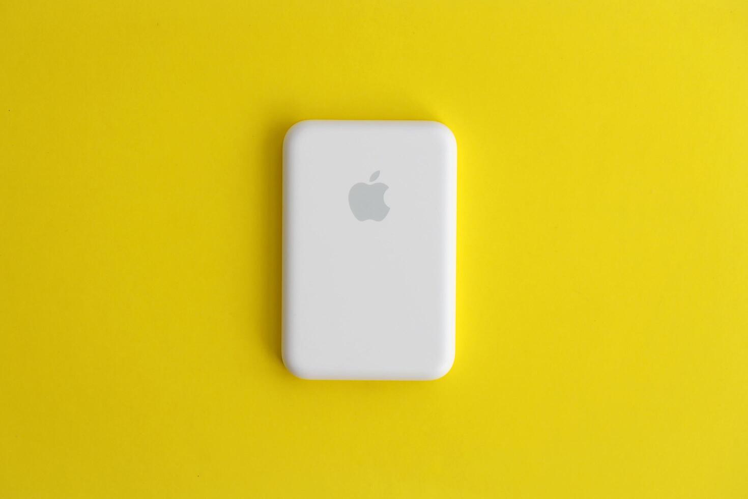 KYIV, UKRAINE - OCTOBER 31, 2023 Apple MagSafe battery device for iPhone charging via magnet connection. Mag Safe modern portable power bank photo