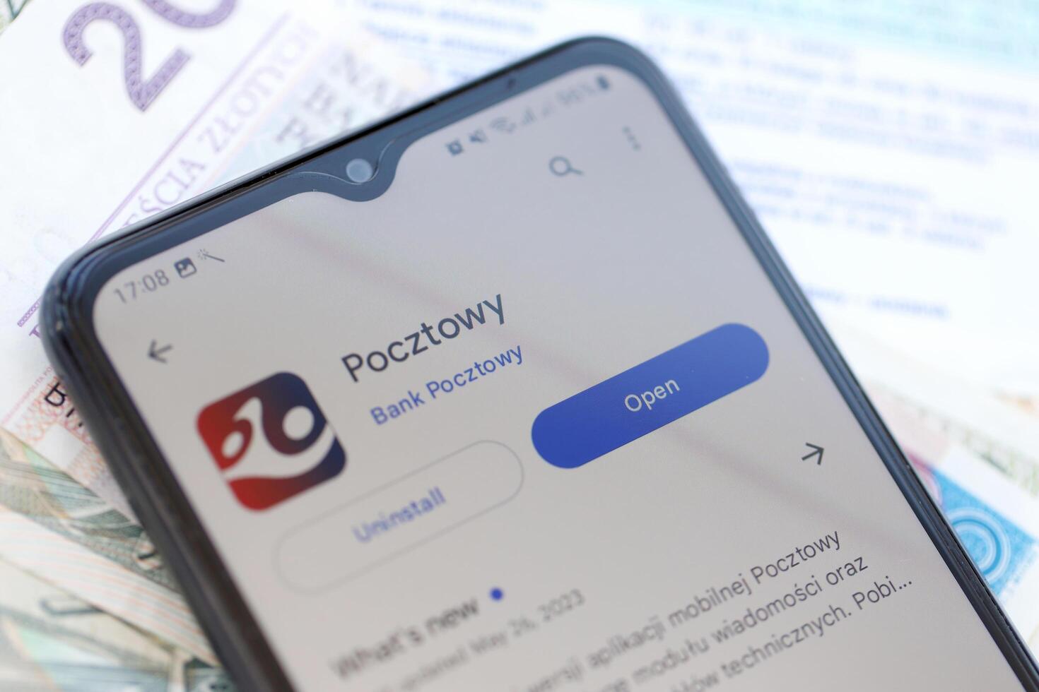 TERNOPIL, UKRAINE - AUGUST 3, 2023 Pocztowy bank application on screen on modern smartphone. Official app of famous polish bank photo